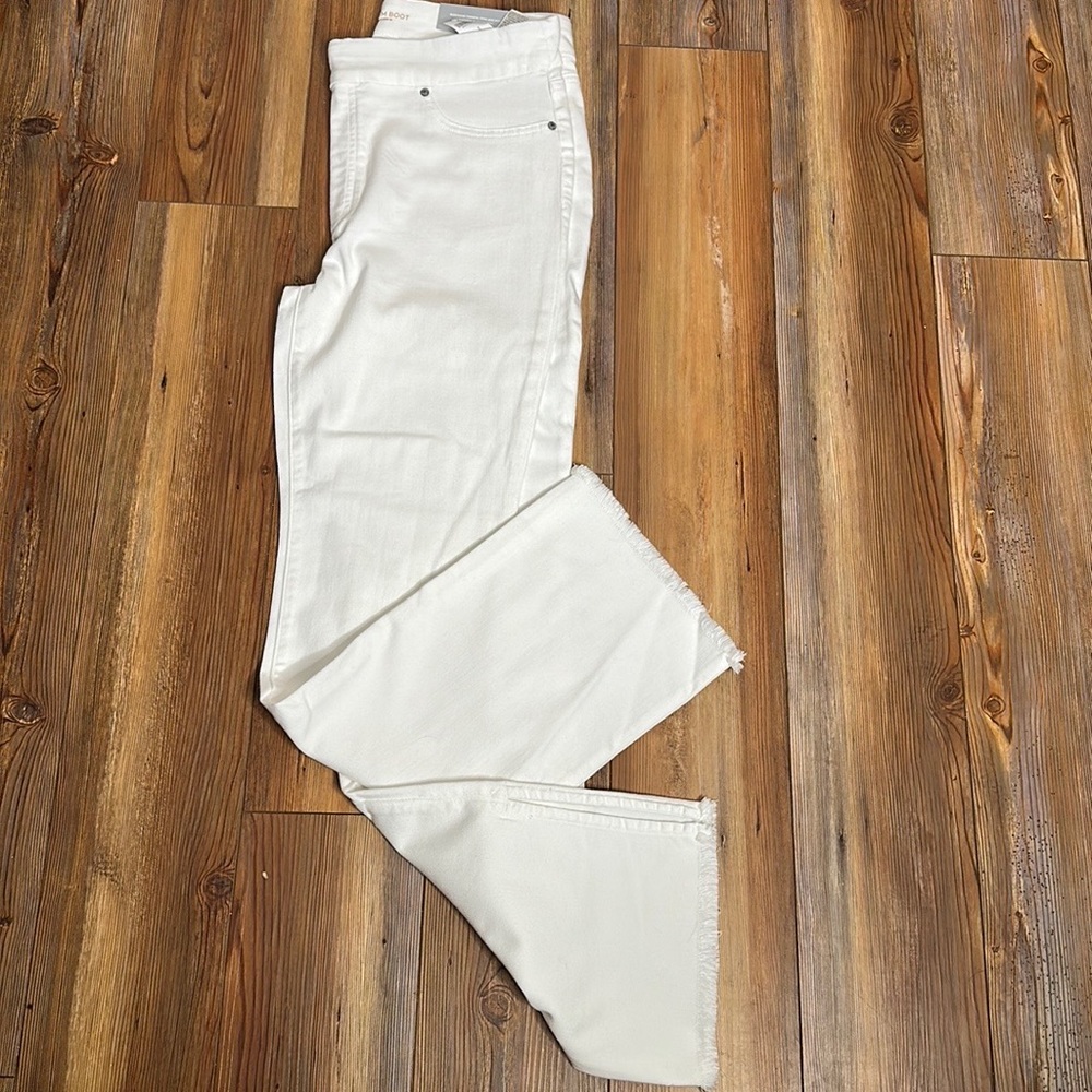 Chicos white distressed boot leg denim jean